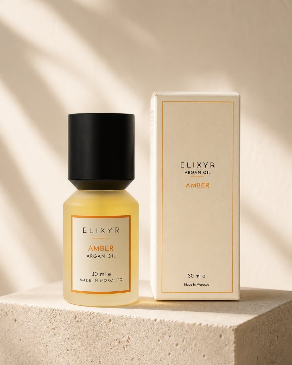 The Amber bottle beside its carton